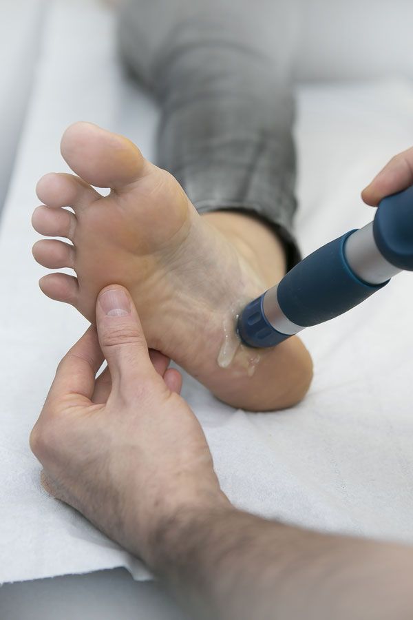 Traitement par ondes de choc sous le pied
